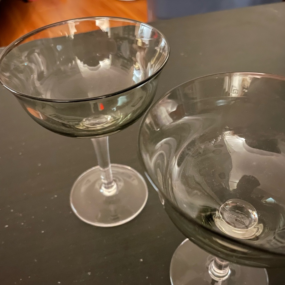Two dark Martini glasses